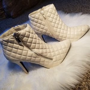 Creme quilted zip up booties